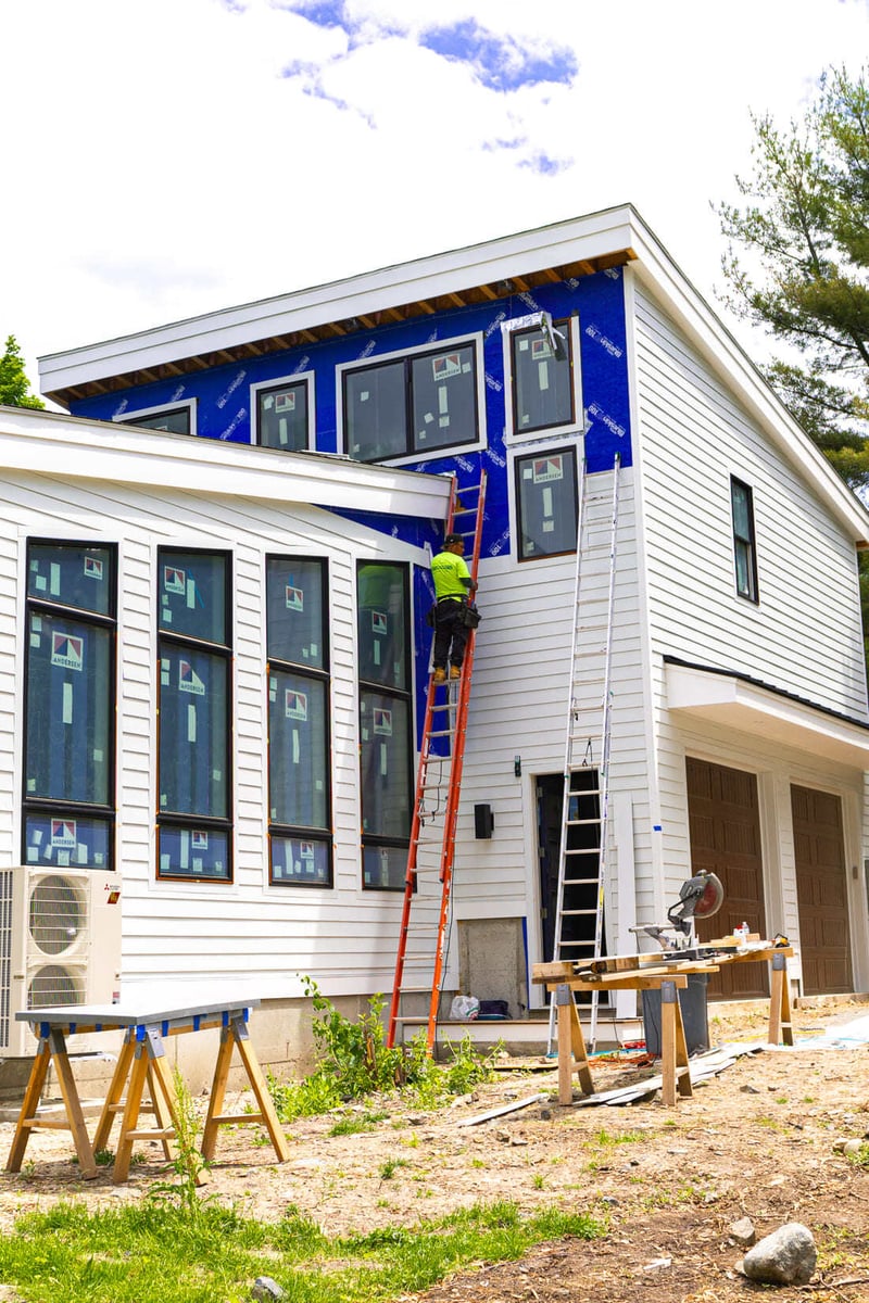 exterior progress photo of home remodel in Boston, MA by Honorato Company