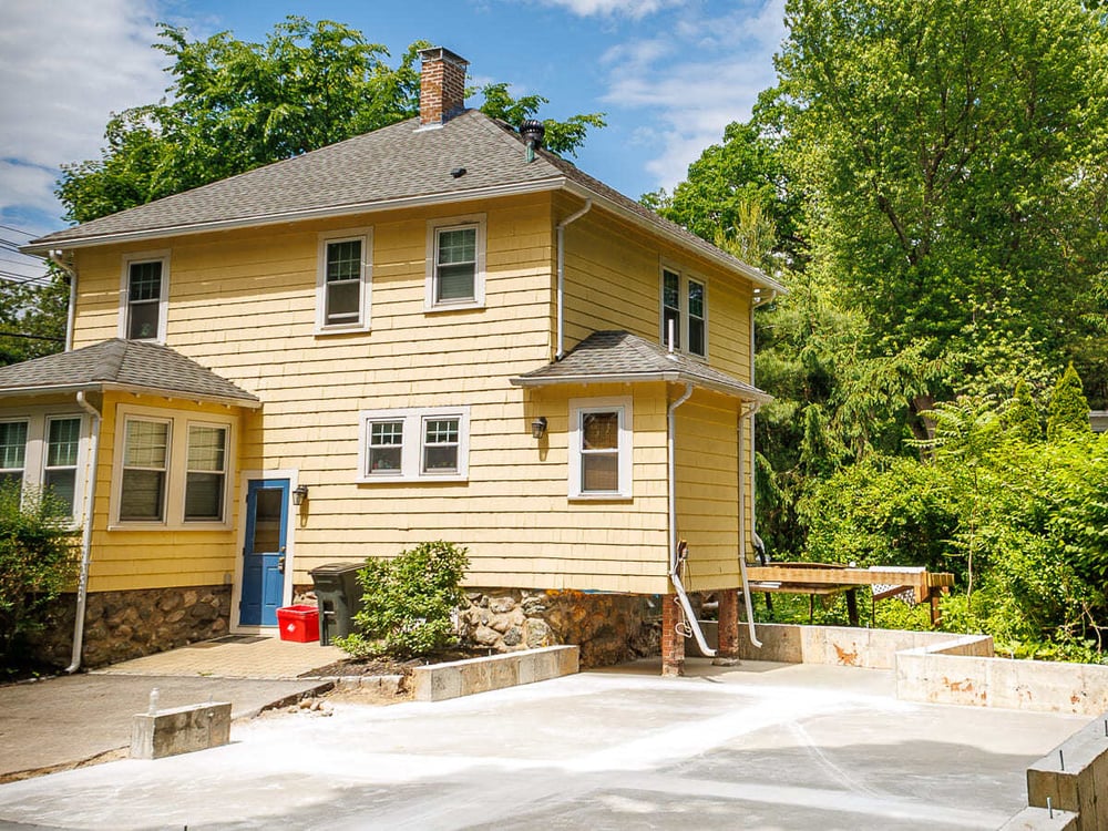 Exterior view of construction progress near Boston, MA by Honorato Company