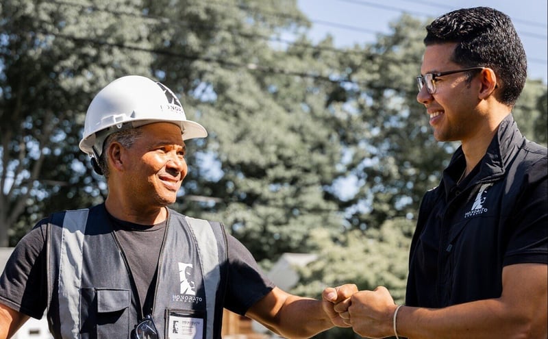 Windson Honorato and contractor on site of construction project in Boston, MA