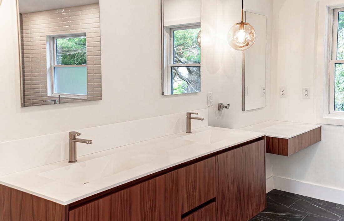 Floating canity with flat panel cabinets in Boston bathroom remodel by Honorato Company Floating canity with flat panel cabinets in Boston bathroom remodel by Honorato Company