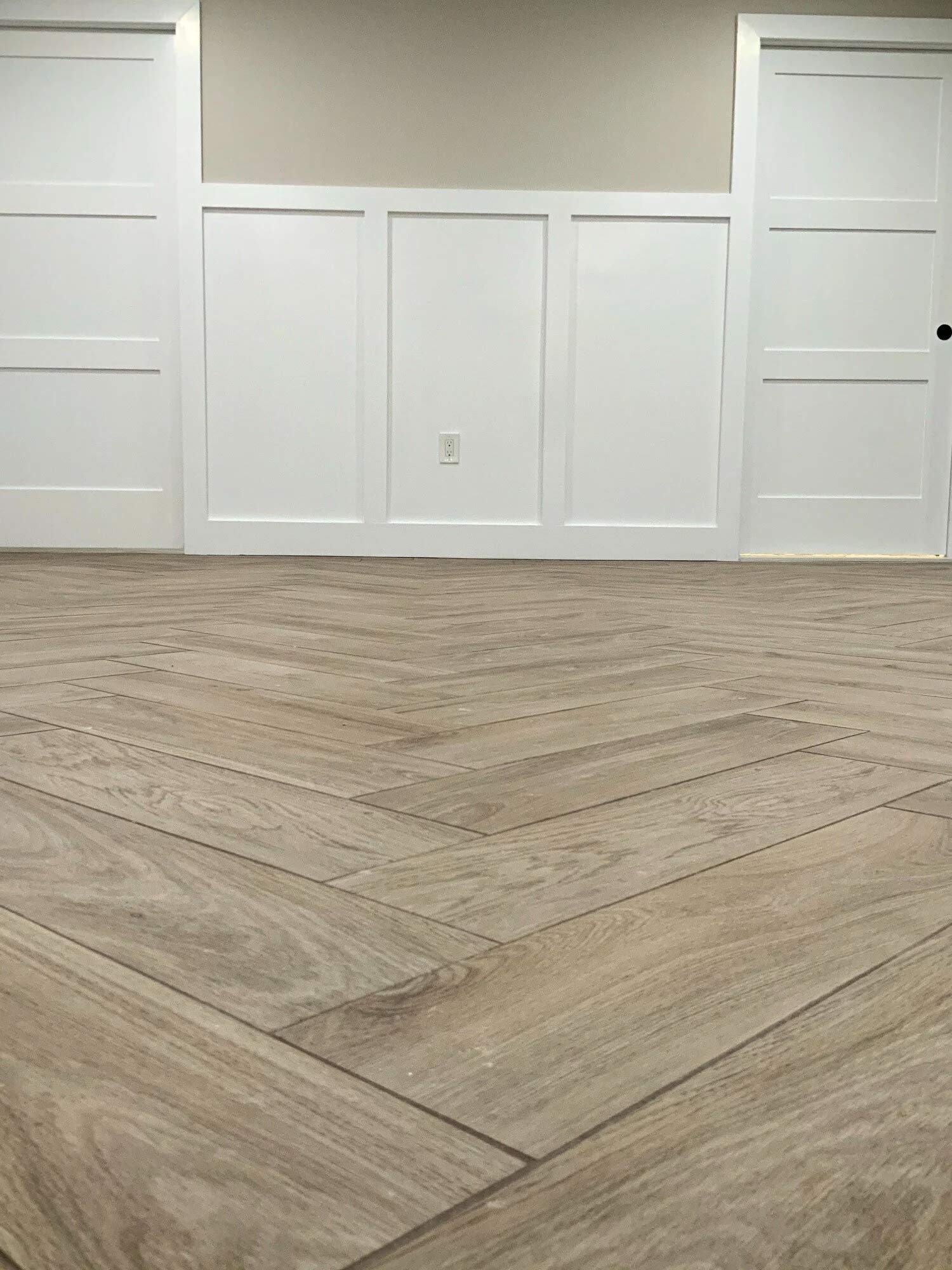 beautiful wood flooring in finished basement