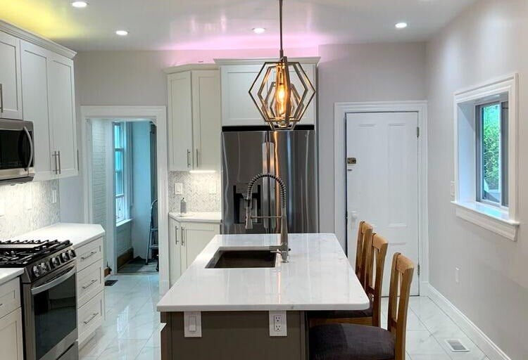 Boston, MA kitchen remodel with pendant light above island by Honorato Company