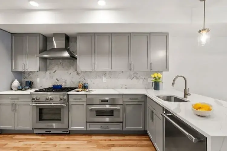 L-shaped kitchen remodel near Boston by Honorato Company