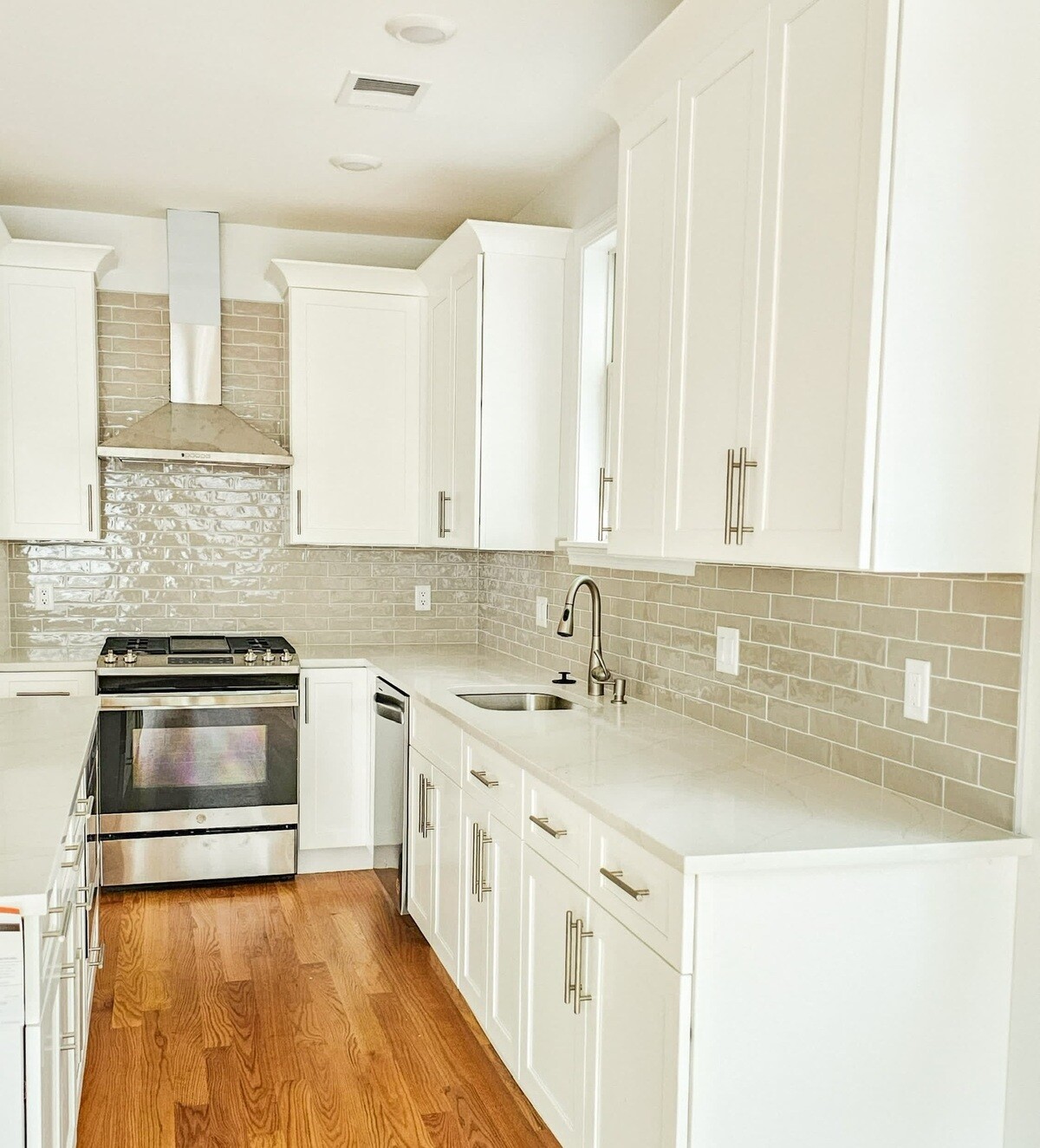 Kitchen remodel near Boston, MA by Honorato Company with subway tile backsplash