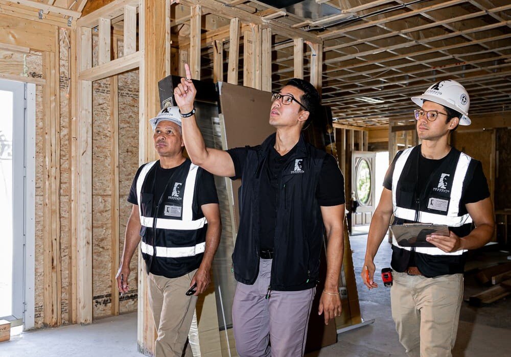 Windson and Honorato Company team walking through construction site near Boston, MA