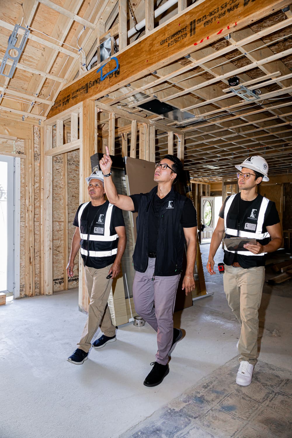 Windson and Honorato Company team walking through construction site near Boston, MA